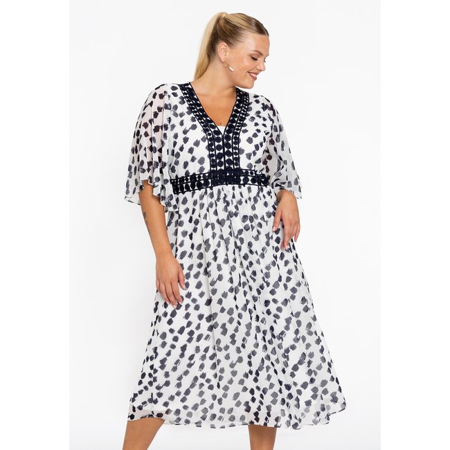 Robe avec imprimé à pois écru <span itemprop=
