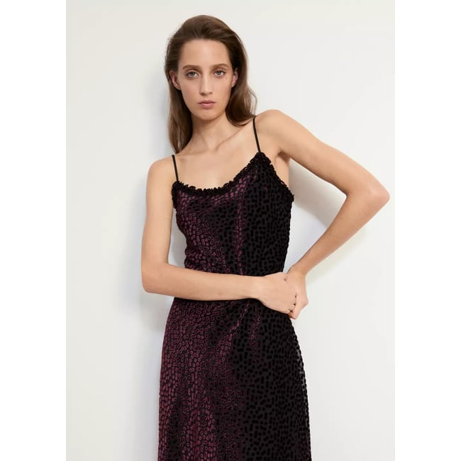Robe à pois en dévoré noir <span itemprop=