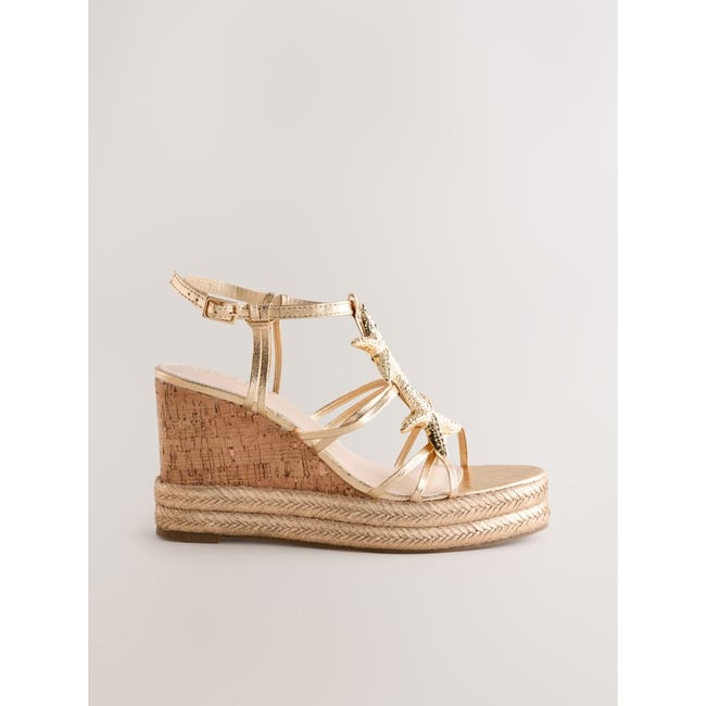 Chaussures compensées breloque étoile de mer doré <span itemprop=