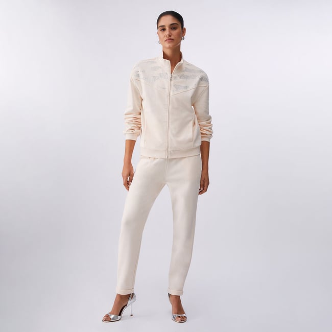 Sweat avec zip et applications champagne <span itemprop=