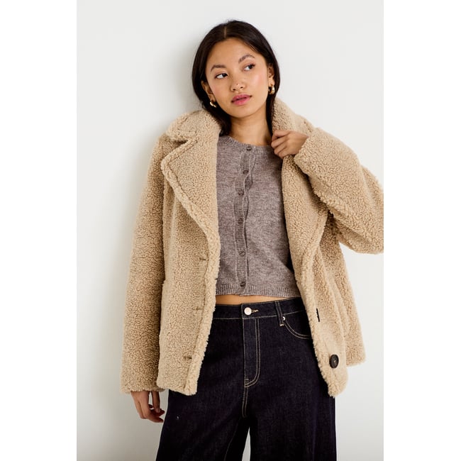 Manteau droit bouclettes col tailleur beige <span itemprop=