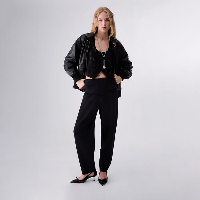 Gilet avec strass noir <span itemprop=