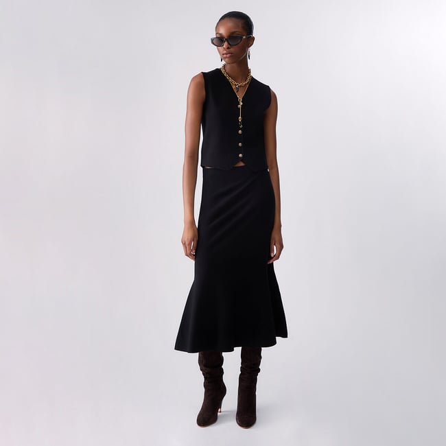Gilet en maille noir <span itemprop=