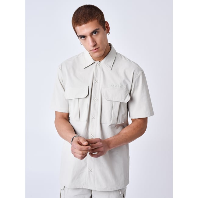 Chemise manches courtes uni texturé greige <span itemprop=