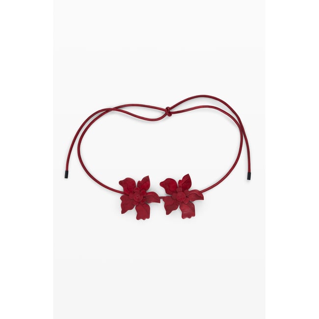 Ceinture fleurs effet cuir rouge <span itemprop=