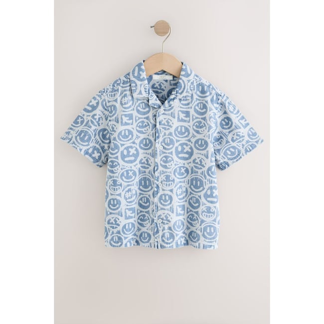 Chemise manches courtes imprimée col revers visage bleu aop <span itemprop=