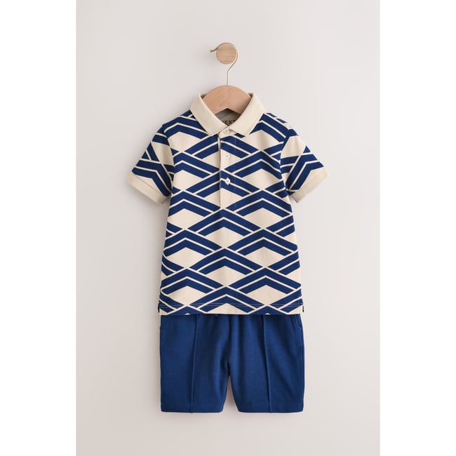 Ensemble polo à manches courtes et short impression abstraite bleue <span itemprop=