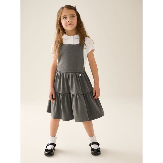 Robe chasuble d’école en jersey à volants gris <span itemprop=