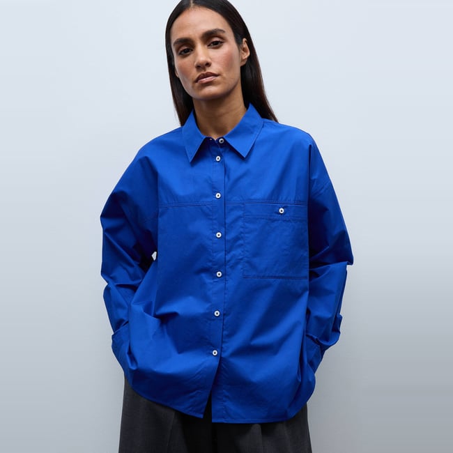Chemise manches longues unie en coton BIO GOTS bleu roi <span itemprop=
