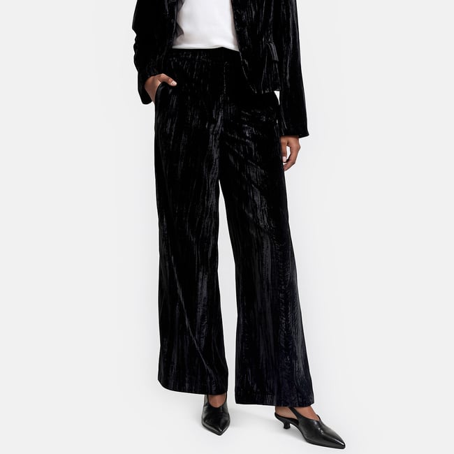 Pantalon large, en velours frappé noir <span itemprop=