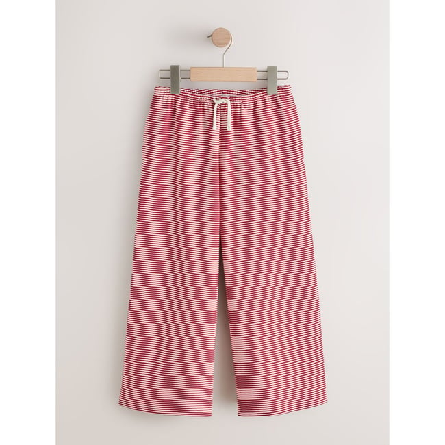 Pantalon large rayé rouge <span itemprop=