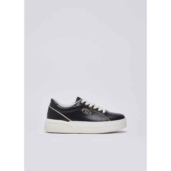 Sneakers en cuir noir <span itemprop=