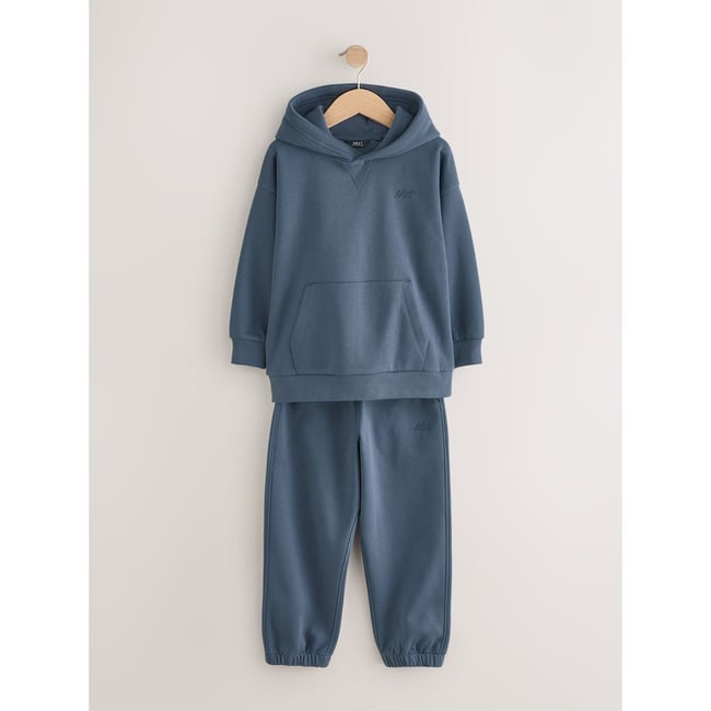 Ensemble sweat et pantalon de jogging bleu <span itemprop=