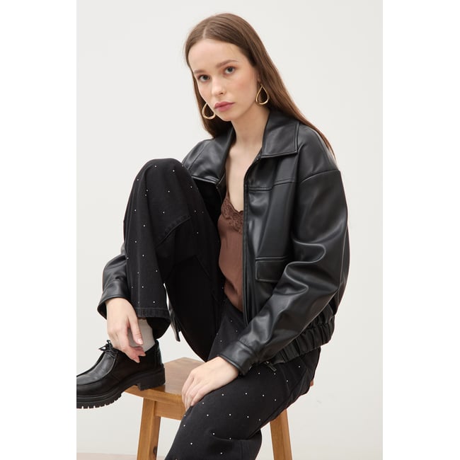 Blouson oversize manches longues noir <span itemprop=