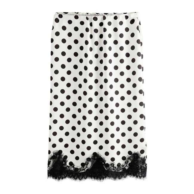 Jupe mi-longue en satin à liseré dentelle crème/pois noirs <span itemprop=