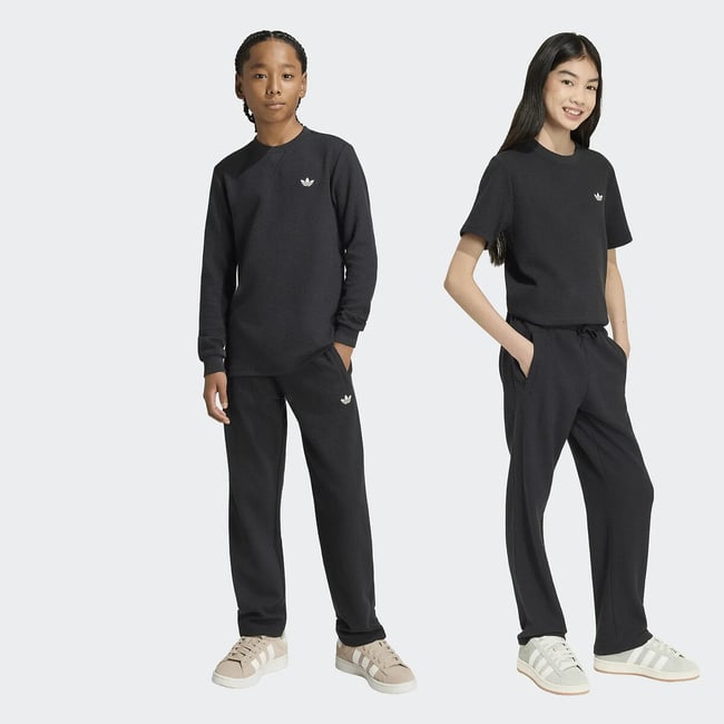 Pantalon de survêtement, en maille gaufrée noir <span itemprop=