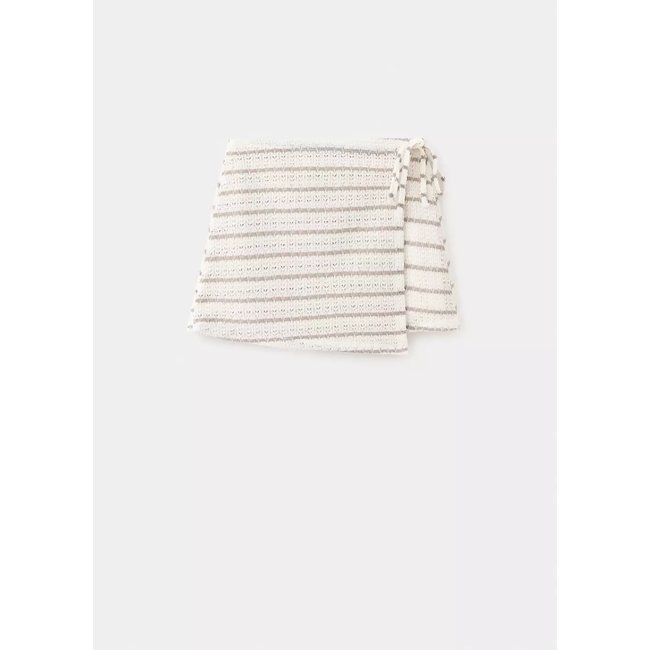 Minijupe crochet nœud écru <span itemprop=