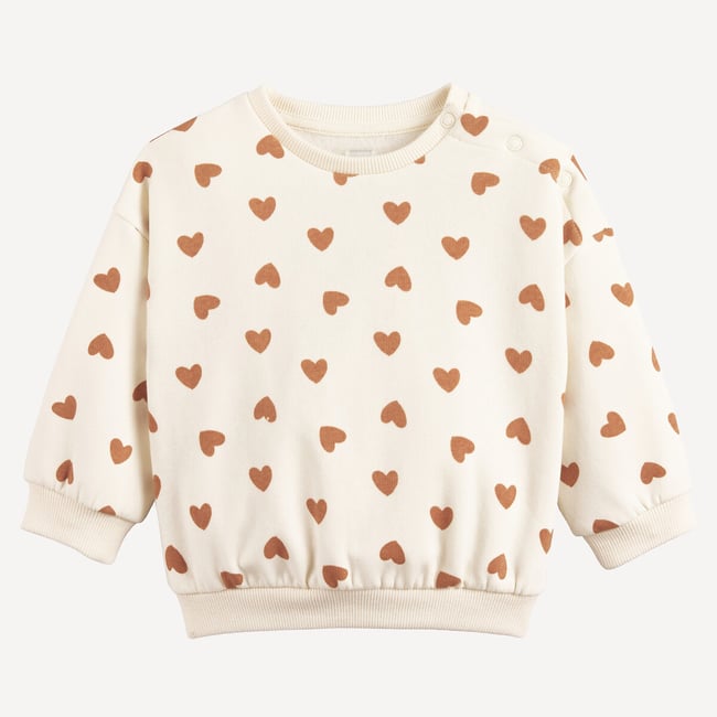 Sweat col rond, imprimé coeurs, pressionné à l'épaule, en molleton ecru <span itemprop=
