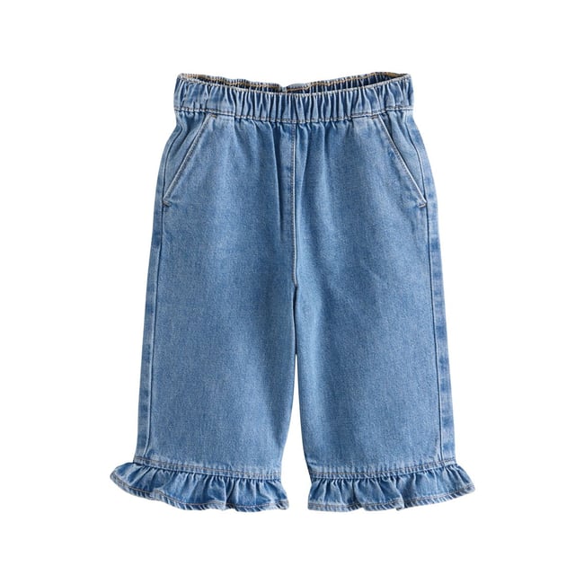 Jean large ourlet à volants en denim <span itemprop=