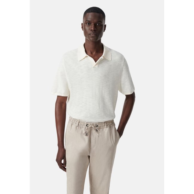 Polo en tricot flammé ecru <span itemprop=