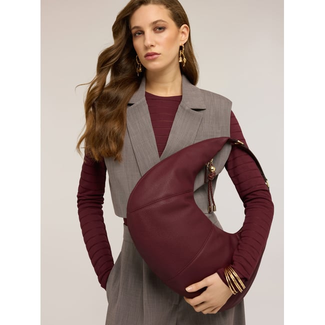 Sac à bandoulière hobo avec pompons burgundy <span itemprop=