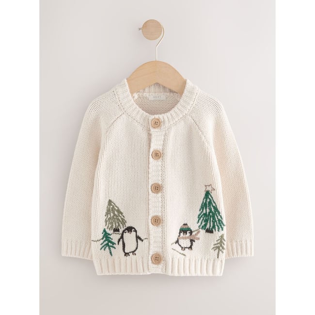 Cardigan à motif de noël pingouin crème <span itemprop=