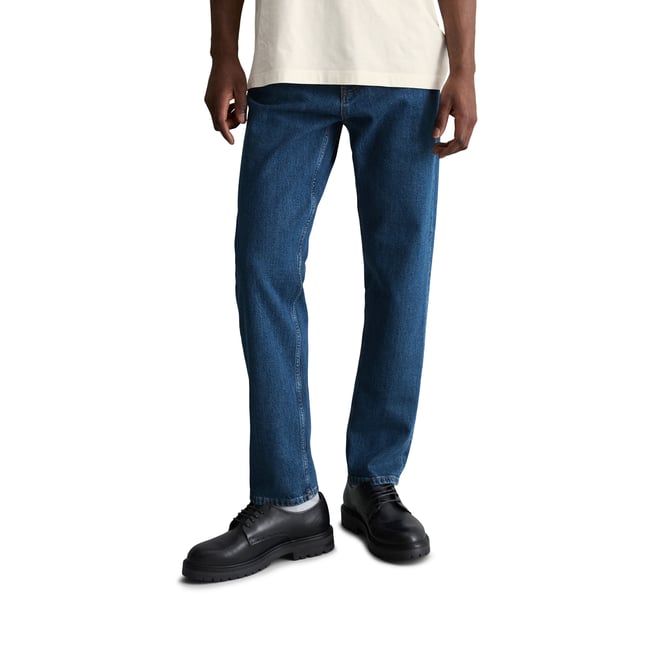 Jeans modèle Linus tapered en coton bio mélangé bleu foncé <span itemprop=