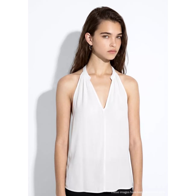 Top fluide asymétrique blanc cassé <span itemprop=