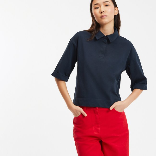 T-shirt col polo manches courtes bleu marine <span itemprop=