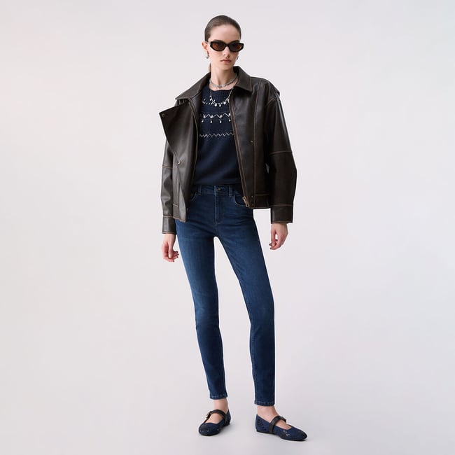 Jean skinny avec ornements denim foncé <span itemprop=