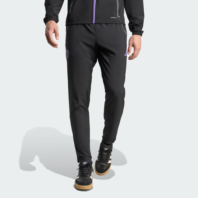 Manchester United Tiro 25 Competition Vis Tech Pantalon De Voyage black / purple rush <span itemprop=