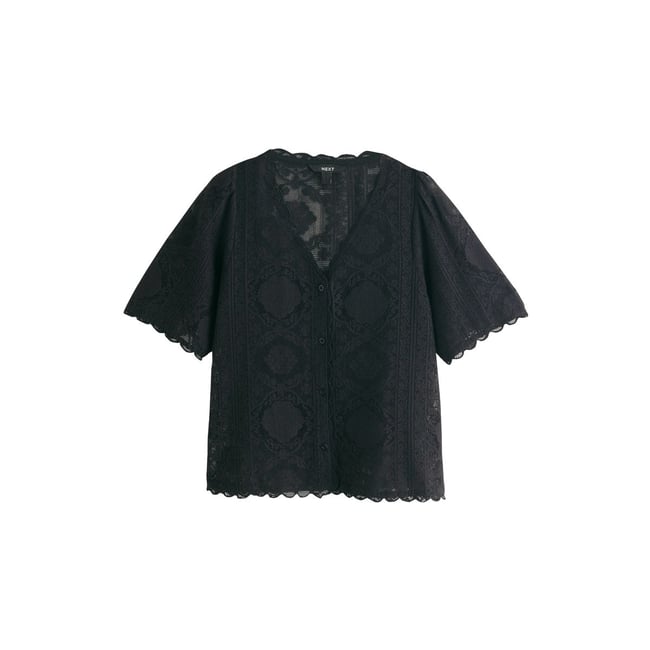 Haut en dentelle à manches courtes et col v noir <span itemprop=