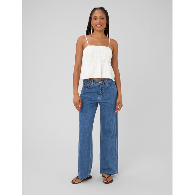 Jean baggy brodé bleu moyen <span itemprop=