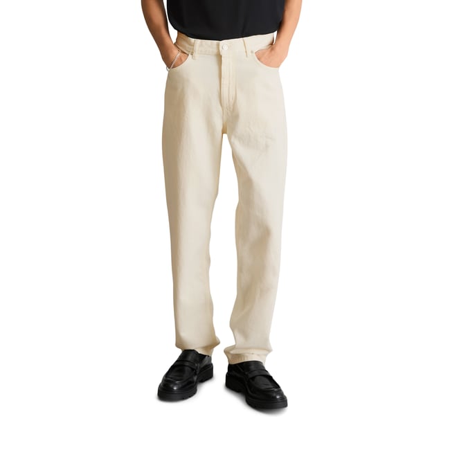 Jeans modèle Runne tapered en pur coton bio blanc <span itemprop=