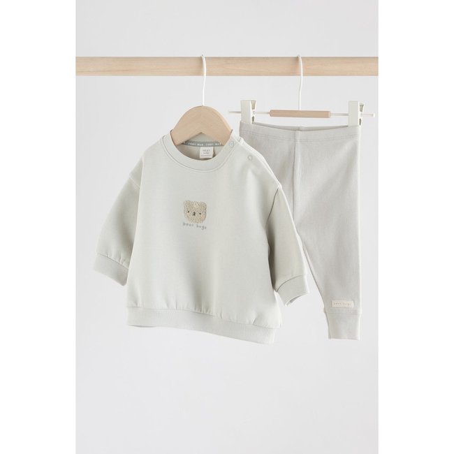 Ensemble sweat à capuche et legging gris <span itemprop=