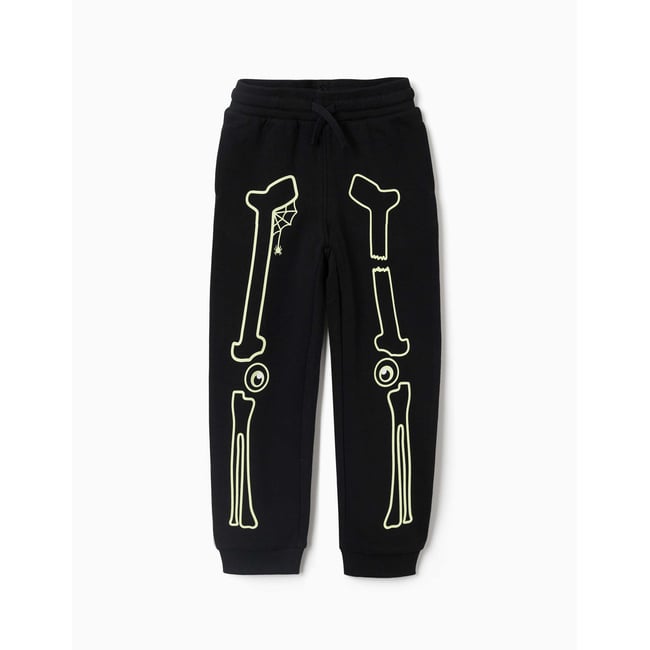 Pantalon de jogging en molleton avec imprimé qui brille dans le noir noir <span itemprop=