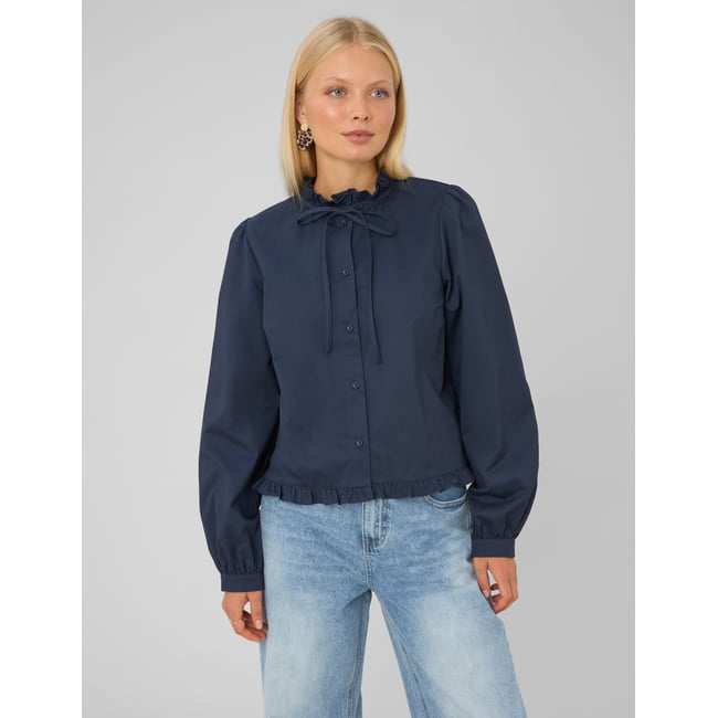 Blouse à volants bleu foncé <span itemprop=