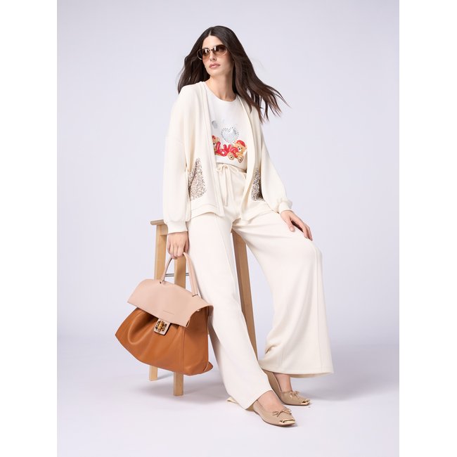 Jogging réalisé en jersey fluide et doux au toucher blanc <span itemprop=
