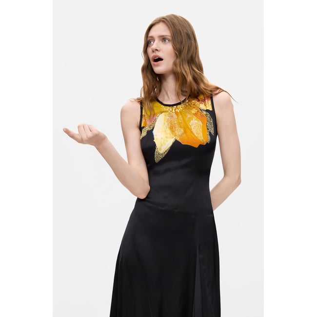 Robe asymétrique sans manches noir <span itemprop=