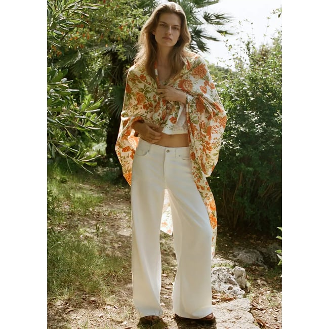 Jean large taille normale blanc <span itemprop=