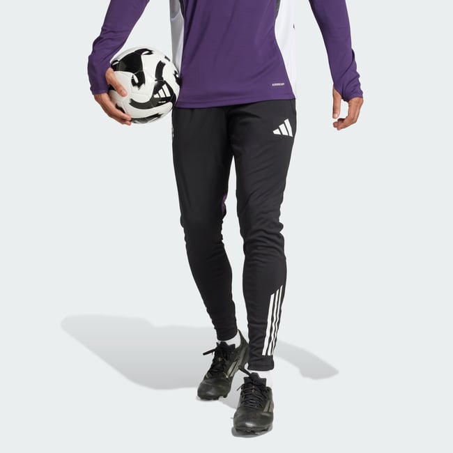 Pantalon D'entraînement Manchester United Tiro 25 Competition black / aurora plum / black <span itemprop=