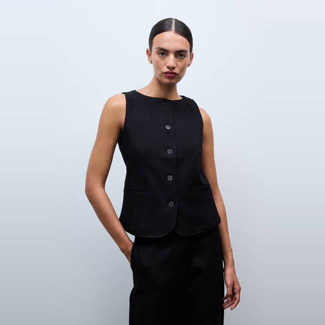 Gilet sans manches uni noir <span itemprop=