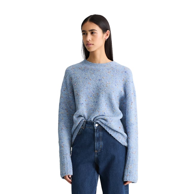 Pull bouclé oversize en mélange de laine vierge et de viscose bleu clair <span itemprop=