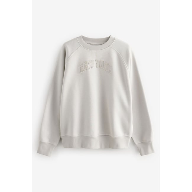 Sweat ras du cou imprimé et manches raglan gris français <span itemprop=