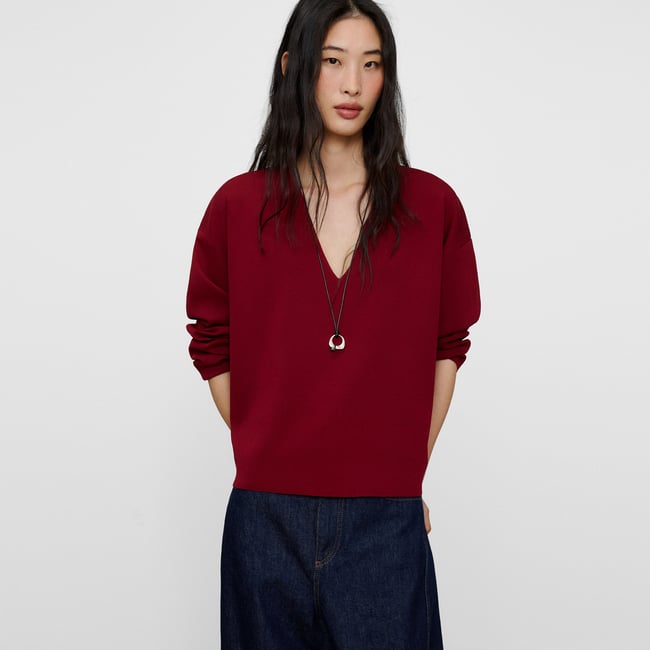 Pull à col en V et manches longues rouge <span itemprop=