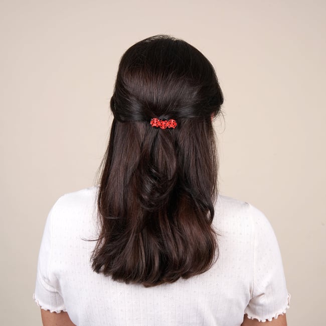 Barrette COCCINELLE rouge à pois noir <span itemprop=