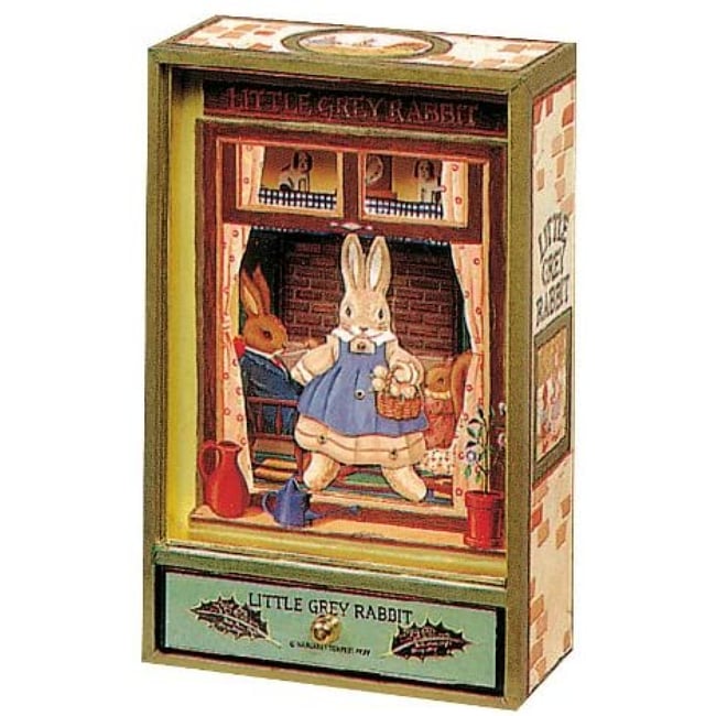 Grande boîte à musique magnétique lapin vert <span itemprop=