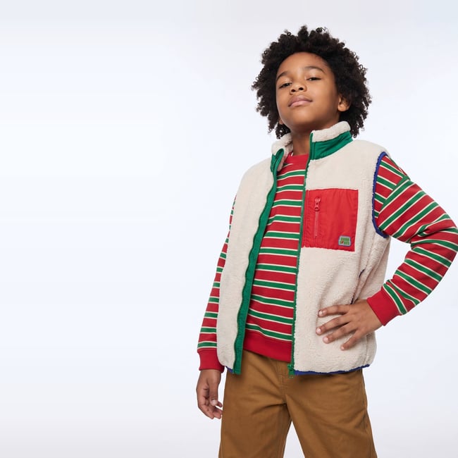 Veste sans manches uni en sherpa naturel <span itemprop=
