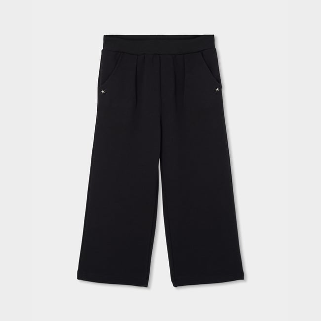 Pantalon fille en maille avec étoiles noir <span itemprop=