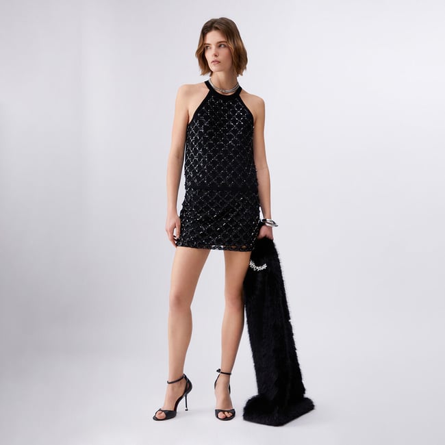 Top avec broderies de bijoux noir <span itemprop=